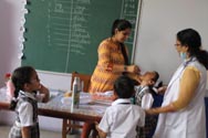 St. Mark's School, Meera Bagh - The next round of deworming takes place : Click to Enlarge