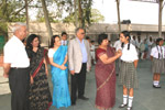 Vice Principal, Mrs. Alka Kher presenting a Badge to the Discipline Incharge &lsquo;Manpreet Kaur&rsquo;