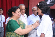 Investiture Ceremony - PRIYA SINGH (XI C) DISCIPLINE INCHARGE RECEIVING HER BADGE