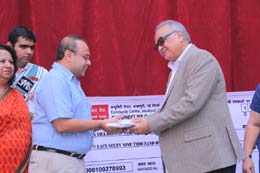 SMS, Janakpuri - The school contributed a cheque of Rs. 2,69,184/- for the S.O.S. Society : Click to Enlarge